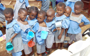 Children queuing for water